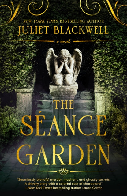 Front cover of The Seance Garden by Juliet Blackwell, paperback