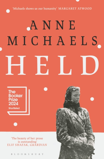 Front cover of Held by Anne Michaels, paperback