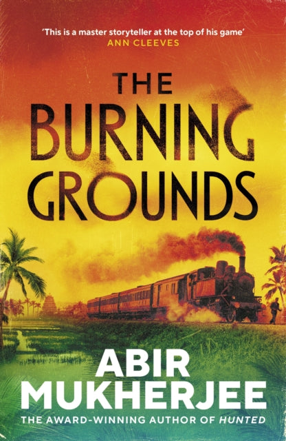 Front cover of The Burning Grounds by Abir Mukherjee, paperback