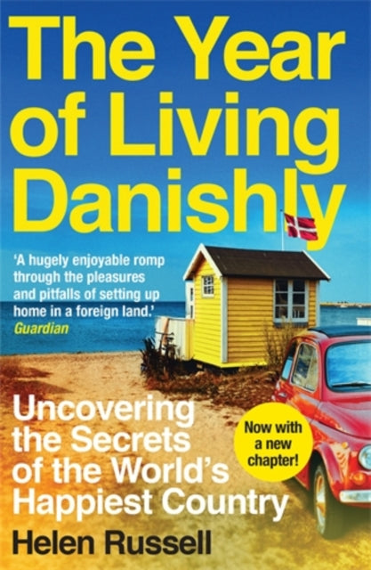 Front cover of The Year of Living Danishly by Helen Russell, paperback