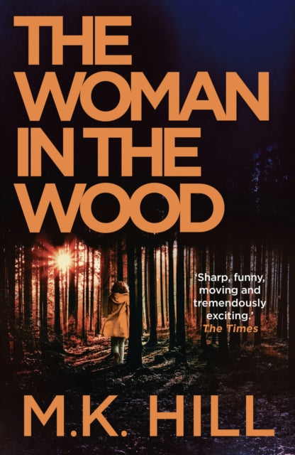 Front cover of The Woman in the Wood by M.K. Hill, paperback