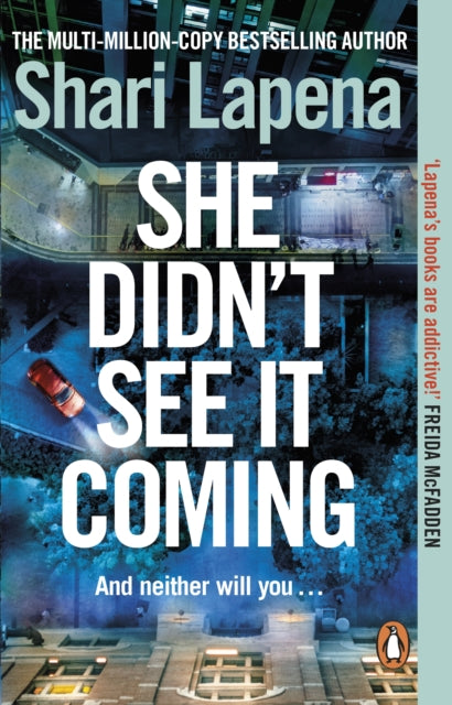 Front cover of She Didn't See It Coming by Shari Lapena, paperback